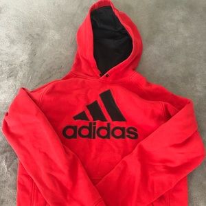 Red and black hoodie from Adidas
